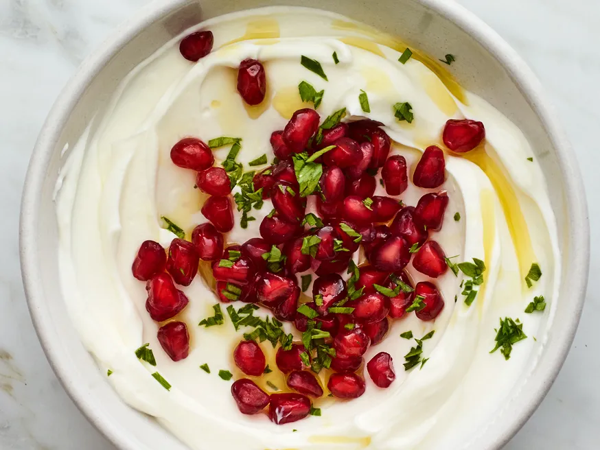 Strained matzoon with pomegranate seeds